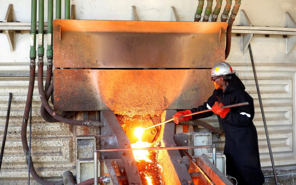 A worker attends to machinery at a smelter plant at Anglo American Platinum's Unki mine in Shurugwi  - Philimon Bulawayo /REUTERS