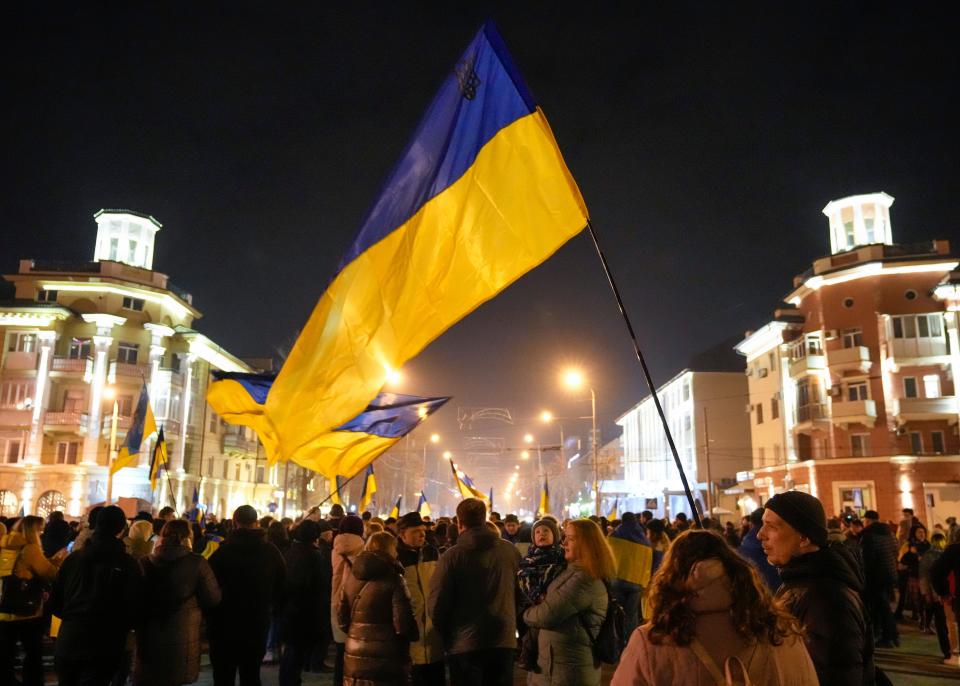 Ukrainians gather for "Mariupol is Ukraine" in Mariupol, Ukraine, Tuesday, Feb. 22, 2022.