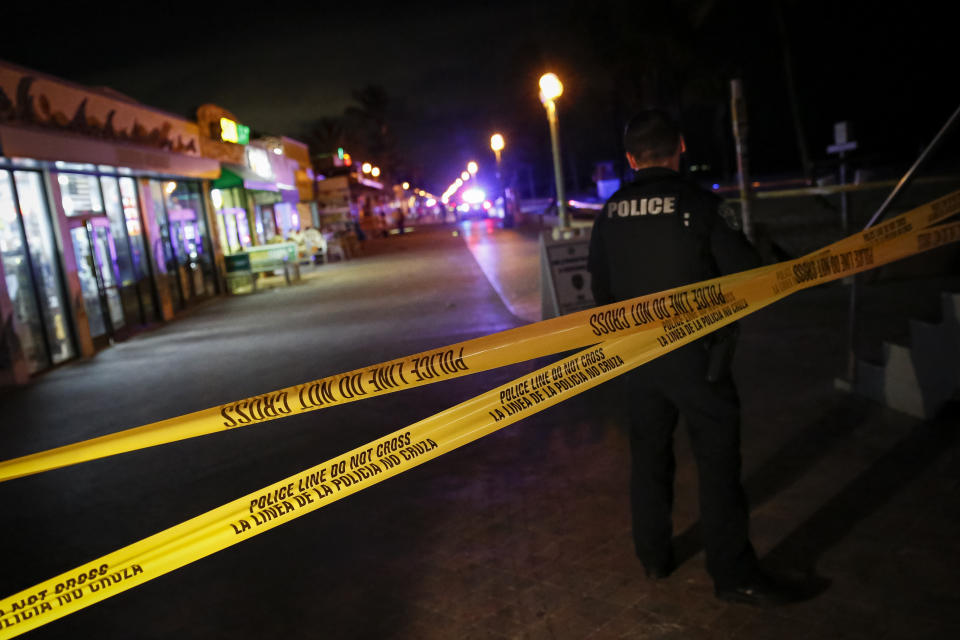 The boardwalk along Hollywood Beach, Florida, is empty, having been cordoned off after the shooting.