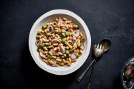 <p>This quick side is all about texture, from the meaty olives to the creamy cannellini beans and crunchy radishes. The mild bean makes the salad a great match for nearly any main.</p> <p><a href="https://www.myrecipes.com/recipe/radish-white-bean-and-olive-salad" rel="nofollow noopener" target="_blank" data-ylk="slk:Radish, White Bean, and Olive Salad Recipe;elm:context_link;itc:0;sec:content-canvas" class="link ">Radish, White Bean, and Olive Salad Recipe</a></p>