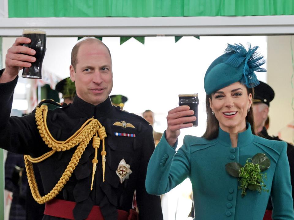 Prince William and Kate Middleton toast beers as part of the senior guardsman's toast on March 17, 2023.