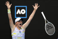 Iga Swiatek of Poland celebrates after defeating Kaia Kanepi of Estonia in their quarterfinal match at the Australian Open tennis championships in Melbourne, Australia, Wednesday, Jan. 26, 2022. (AP Photo/Tertius Pickard)