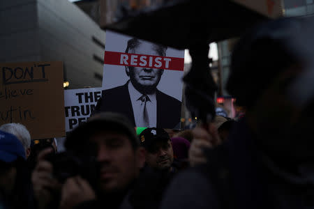 Protesters attend a demonstration against U.S. President Donald Trump on Presidents' Day in Union Square, New York, U.S., February 18, 2019. REUTERS/Go Nakamura