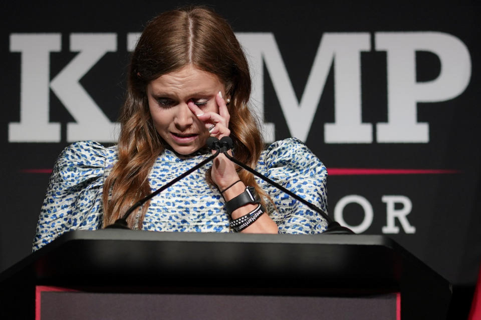 Amy Porter Kemp, introduces her father, Republican Gov. Brian Kemp during an election night watch party, Tuesday, May 24, 2022, in Atlanta. Gov. Kemp easily turned back a GOP primary challenge Tuesday from former U.S. Sen. David Perdue, who was backed by former President Donald Trump. (AP Photo/John Bazemore)