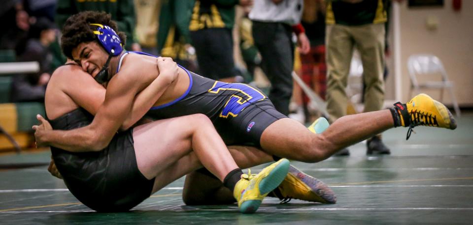 Jefferson's Malachi Pribyl, drives Kaden Luff of Flat Rock to the mat at 190 pounds Wednesday night.