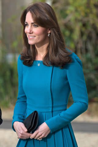 <p>Zak Hussein/Corbis via Getty</p> Kate Middleton visits Action on Addiction in Wiltshire in 2015