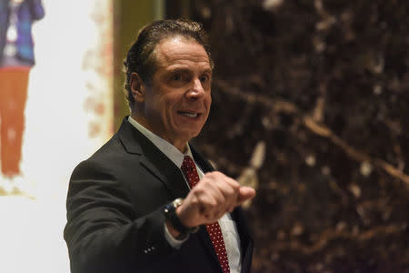 Andrew Cuomo, Governor of New York, arrives at Trump Tower in New York City, U.S. January 18, 2017. REUTERS/Stephanie Keith