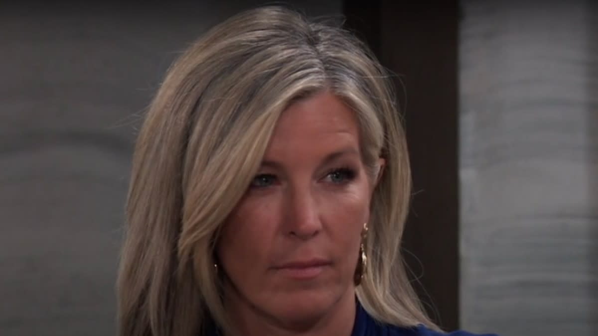  Laura Wright as Carly smirking in General Hospital. 