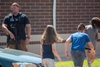 <p>Police asses the scene outside Noblesville High School after a shooting at Noblesville West Middle School on May 25, 2018 in Noblesville, Ind. (Photo: Kevin Moloney/Getty Images) </p>