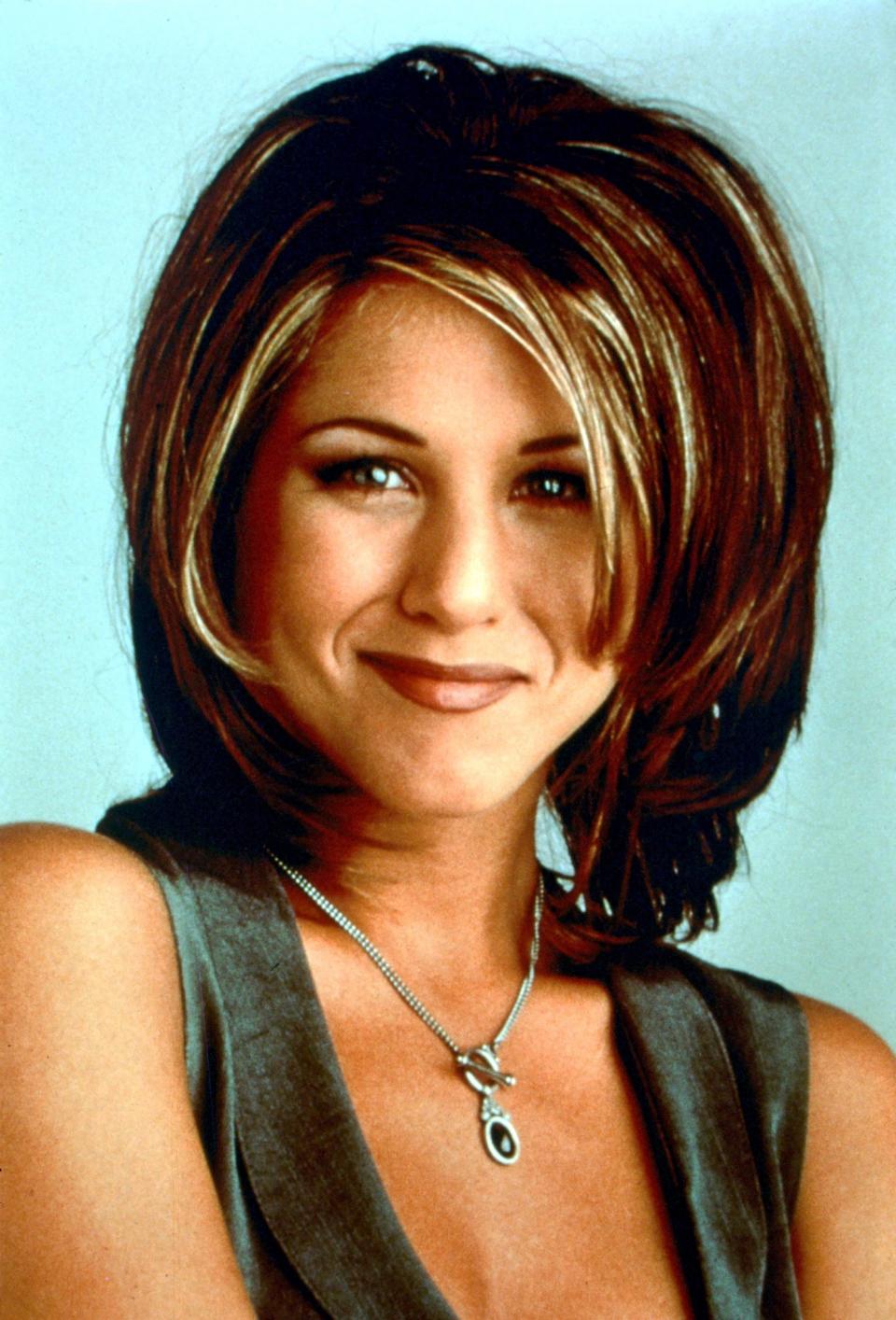 <p>The hairstyle that Jennifer Aniston rocked in ‘Friends’ became so famous that women would literally book hair appointments and ask for ‘The Rachel’. <em>[Photo: Rex Features]</em> </p>