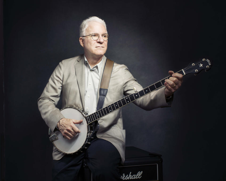 FILE - Steve Martin poses for a portrait in New York to promote his new album "So Familiar," with Edie Brickell on Sept. 2, 2015. Martin is the subject of a new documentary "Steve! (Martin) a Documentary in 2 Pieces." (Photo by Victoria Will/Invision/AP, File)