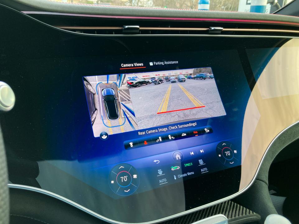 The 2023 Mercedes-Benz EQS SUV&#39;s center touchscreen displaying parking camera views.