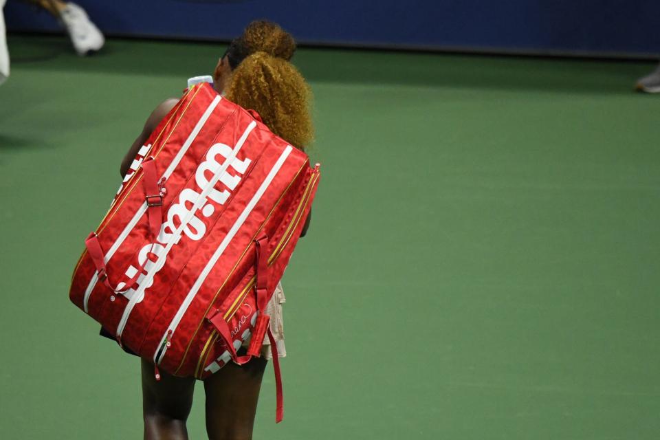 Serena Williams walks off the court after her three-set loss to Victoria Azarenka in their U.S. Open semifinal.