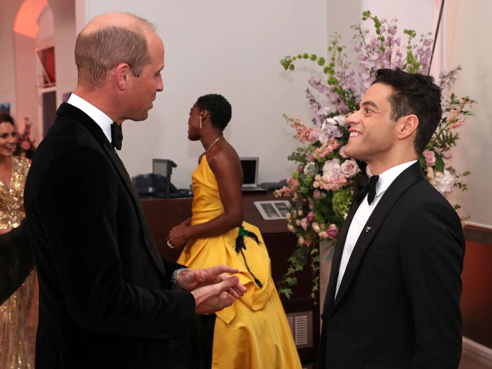 Prince William speaking with Rami Malek at the UK premiere of 