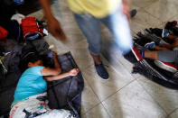 A Central American migrant, moving in a caravan through Mexico, sleeps at a temporary shelter, in Hermosillo, Sonora state, Mexico April 23, 2018. REUTERS/Edgard Garrido