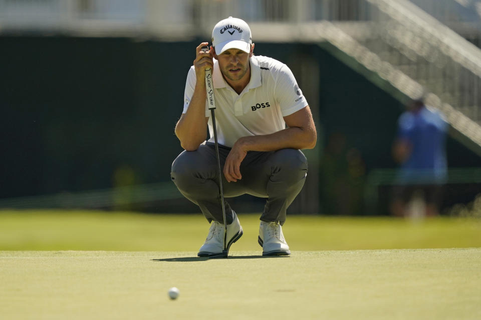 Thomas Detry, of Belgium, studies his lie on the ninth green during the second day of the Sanderson Farms Championship golf tournament in Jackson, Miss., Friday, Sept. 30, 2022. (AP Photo/Rogelio V. Solis)