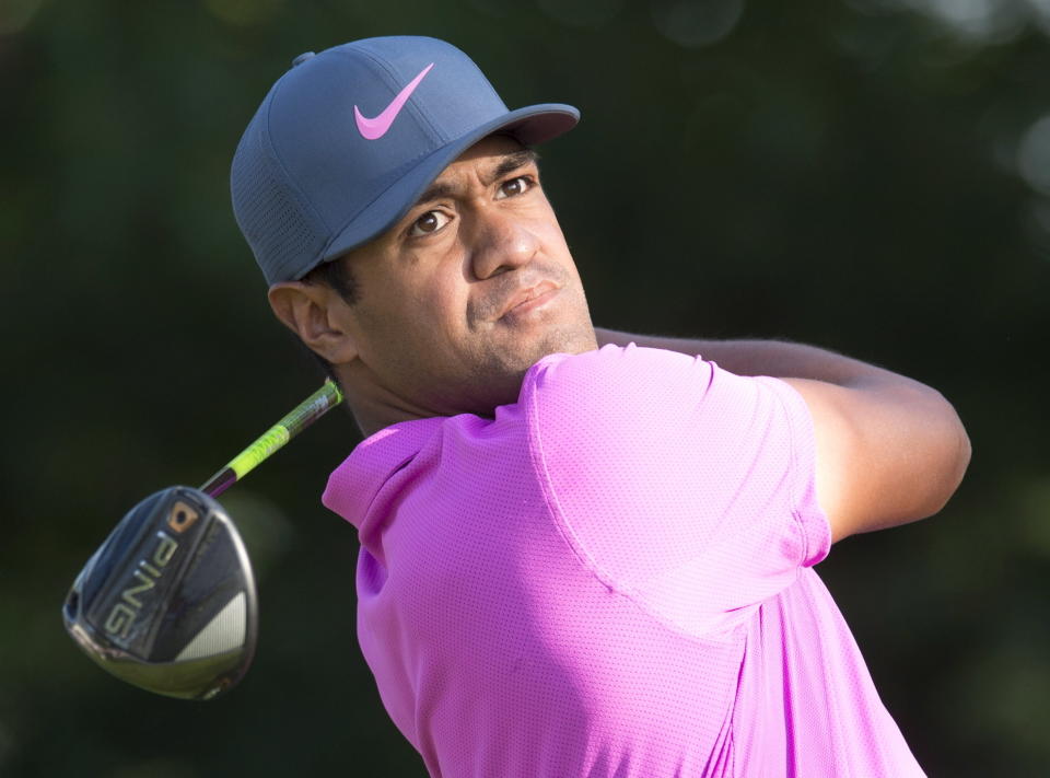 Tony Finau tees off on the 10th hole during the first round of the the Canadian Open golf tournament at Glen Abbey in Oakville, Ontario, Thursday, July 26, 2018. (Frank Gunn/The Canadian Press via AP)