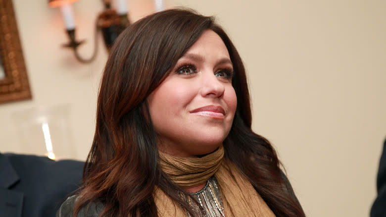 Rachael Ray wearing gold scarf