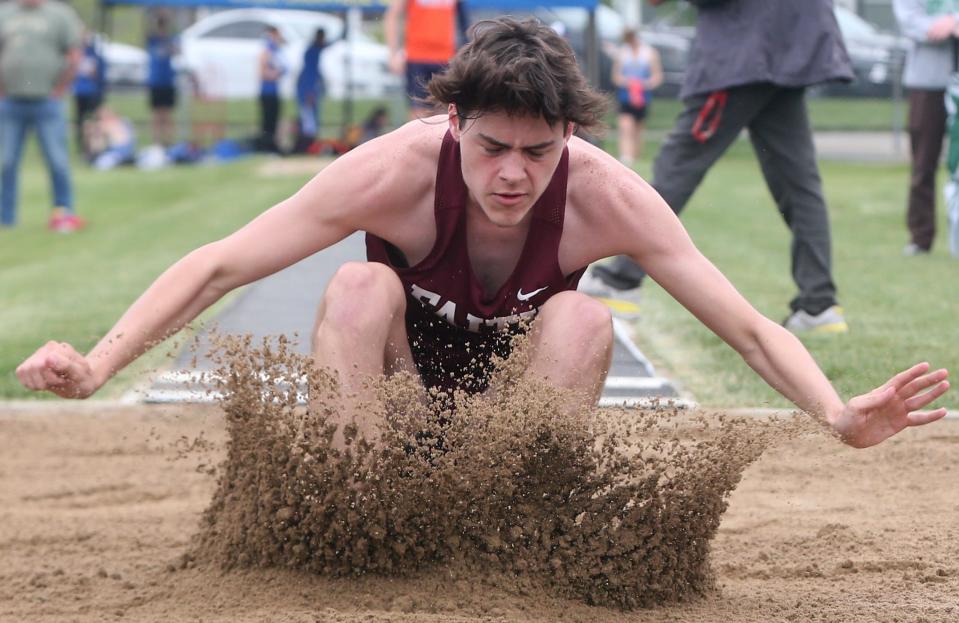 Faith Christian Jacob Hill competes in the long jump during the IHSAA boy’s track and field sectional meet, Thursday, May 16, 2024, at West Lafayette High School in West Lafayette, Ind.