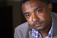 In this photo taken Monday, Sept. 23, 2019, Yonas Yeshanew, who resigned as Ethiopian Airline's chief engineer this summer and is seeking asylum in the U.S., listens to a reporter's question during an interview in Seattle area. Yeshanew says in a whistleblower complaint filed with regulators that the carrier went into the maintenance records on a Boeing 737 Max jet a day after it crashed this year, a breach he contends was part of a pattern of corruption that included fabricating documents, signing off on shoddy repairs and even beating those who got out of line. (AP Photo/Elaine Thompson)