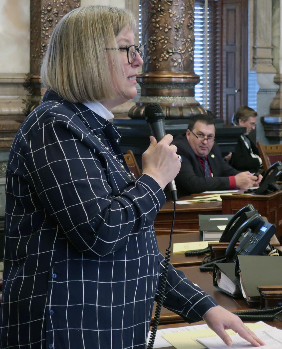 Kansas state Sen. Molly Baumgardner, R-Louisburg, speaks in favor of a bill containing Democratic Gov. Laura Kelly's proposal for a public school funding increase, Thursday, April 4, 2019, at the Statehouse in Topeka, Kansas. Legislators have approved Kelly's plan for an increase of roughly $90 million a year. (AP Photo/John Hanna)