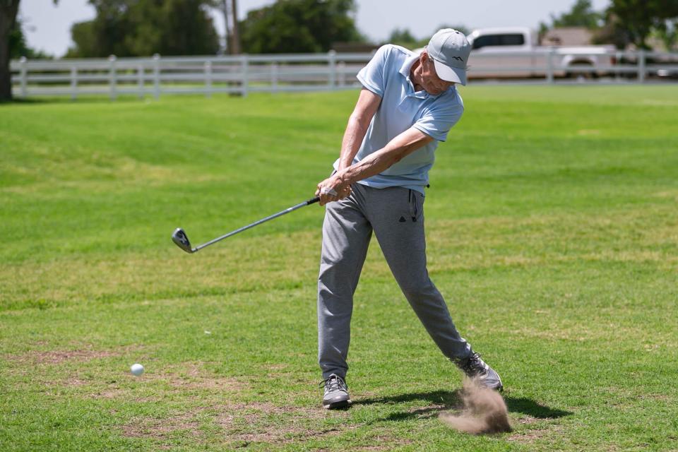 Tim Bench, who recently recorded his seventh hole-in-one at the age of 73, tees up at Surrey Hills Golf Course in Oklahoma City on Wednesday, May 11, 2022.