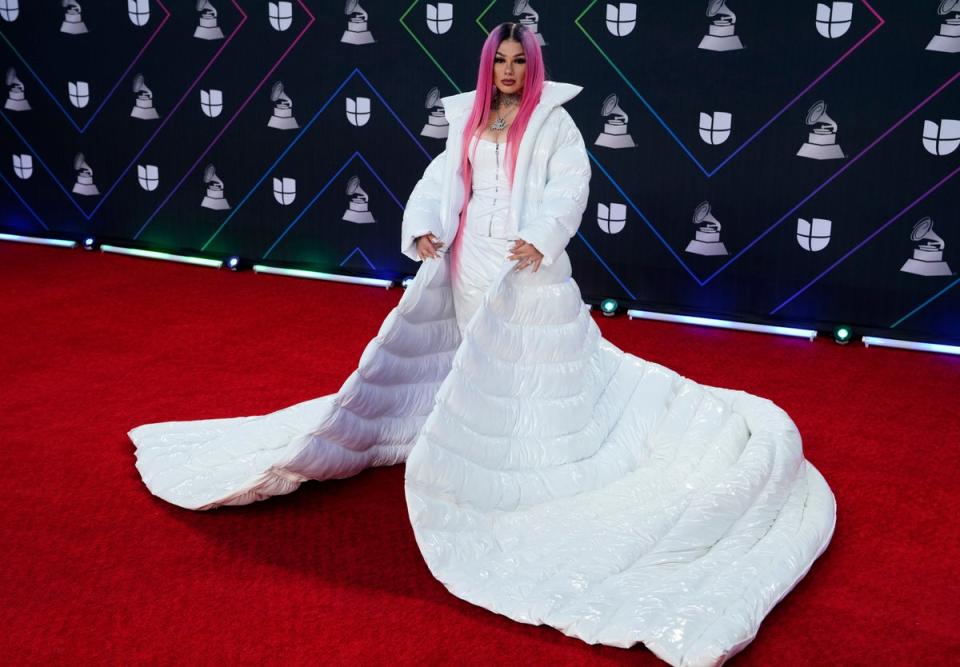 Snow Tha Product arrives at the 22nd annual Latin Grammy Awards on Thursday, Nov. 18, 2021, at the MGM Grand Garden Arena in Las Vegas. (Eric Jamison/Invision/AP)