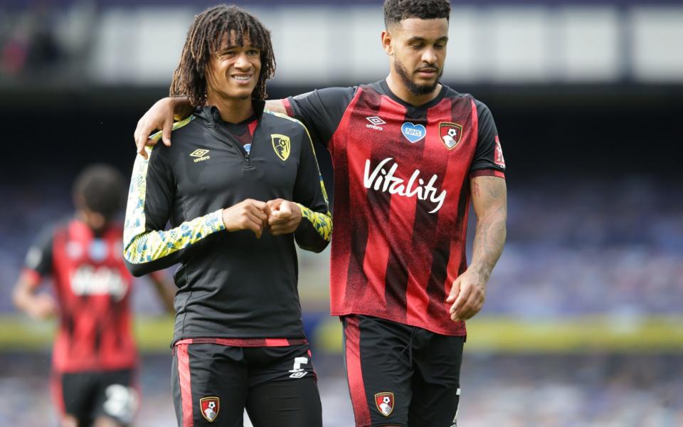 Nathan Ake and Joshua King of Bournemouth leave the pitch after their side are relegated after the Premier League - GETTY IMAGES