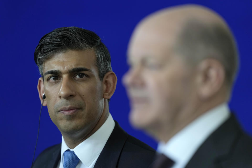 Britain's Prime Minister Rishi Sunak, left, listens to German Chancellor Olaf Scholz during a press conference in Berlin, Germany, Wednesday, April 24, 2024.(AP Photo/Alastair Grant, Pool)