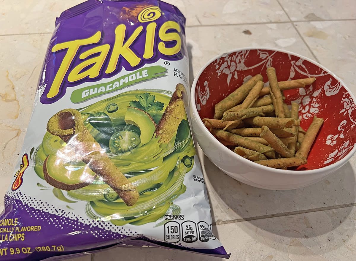 Takis guacamole rolled tortilla chips in a bowl and a bag