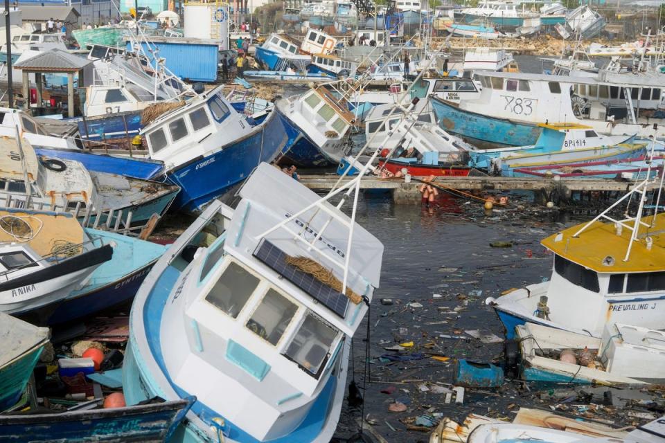 Fishing vessels damaged by Hurricane Beryl at the Bridgetown Fisheries in Barbados (AP)
