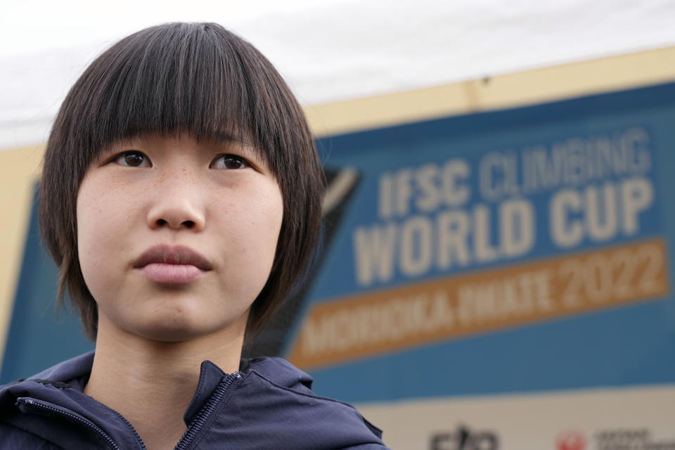 Ai Mori of Japan speaks after attending the women's lead semi-final of the IFSC Climbing World Cup Friday, Oct. 21, 2022, in Morioka, Iwate Prefecture, Japan. After Iranian climber Elnaz Rekabi joined a growing list of female athletes who have been targeted by their governments for defying authoritarian policies or acting out against bullying, a number of others have spoken out on their concerns of politics crossing into their sporting world. (AP Photo/Eugene Hoshiko)