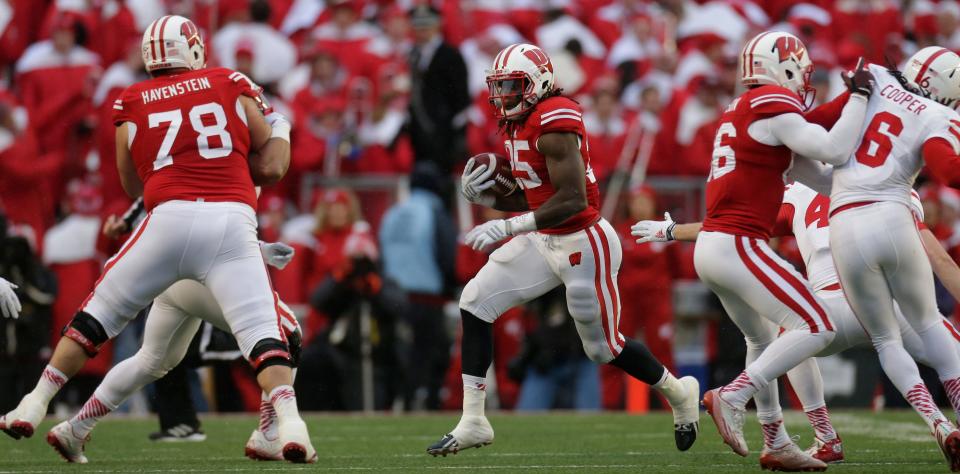 Melvin Gordon set an NCAA single-game record with 408 yards rushing in a win over Nebraska on Nov. 15, 2014, in Madison.