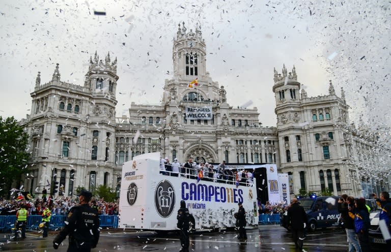 Real Madrid football players arrive to celebrate the team's win on Plaza Cibeles in Madrid on May 29, 2016