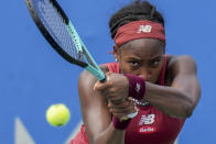 FILE - Coco Gauff hits the ball back to Maria Sakkari, of Greece, during the women's singles final of the DC Open tennis tournament Sunday, Aug. 6, 2023, in Washington. Gauff has won the two biggest titles of her career heading into the U.S. Open, where play begins on Aug. 28. (AP Photo/Alex Brandon, File)