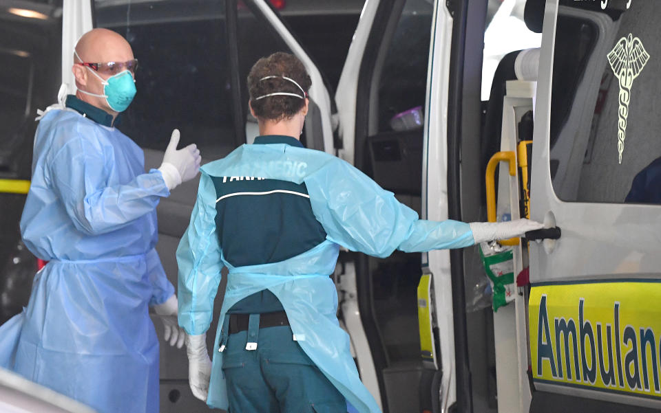 Paramedics are seen at the Hotel Grand Chancellor in Brisbane.