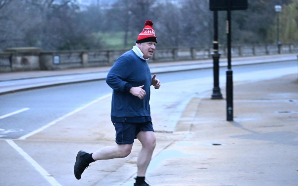 Boris Johnson goes jogging today after being reselected to run for the Conservatives in Uxbridge - Jeremy Selwyn