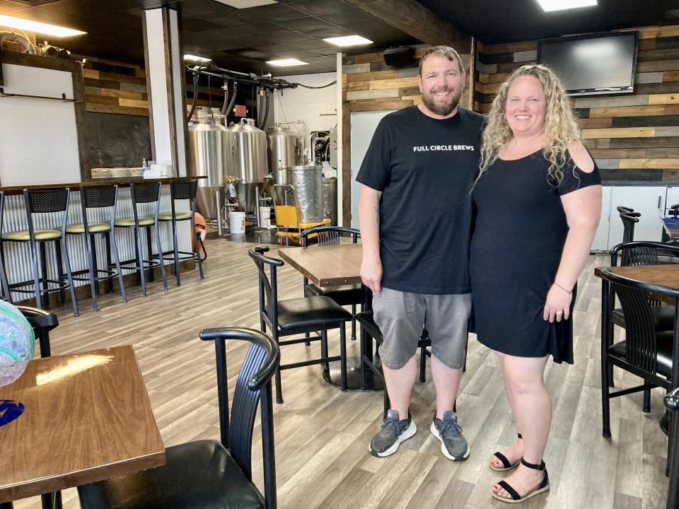 Colleen and Nick Miller stand in Four Circles Brewery at 709 W. Grand River Ave. in downtown Brighton.