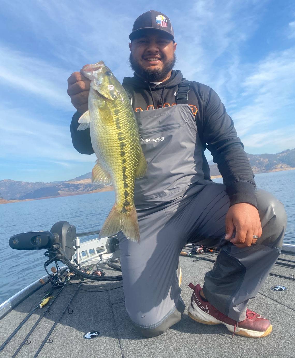 Phillip Aramburu shows off his catch made Tuesday, Dec. 8, 2020 at Lake Don Pedro trolling a River2Sea S-Waver Lite in trout color over island tops.