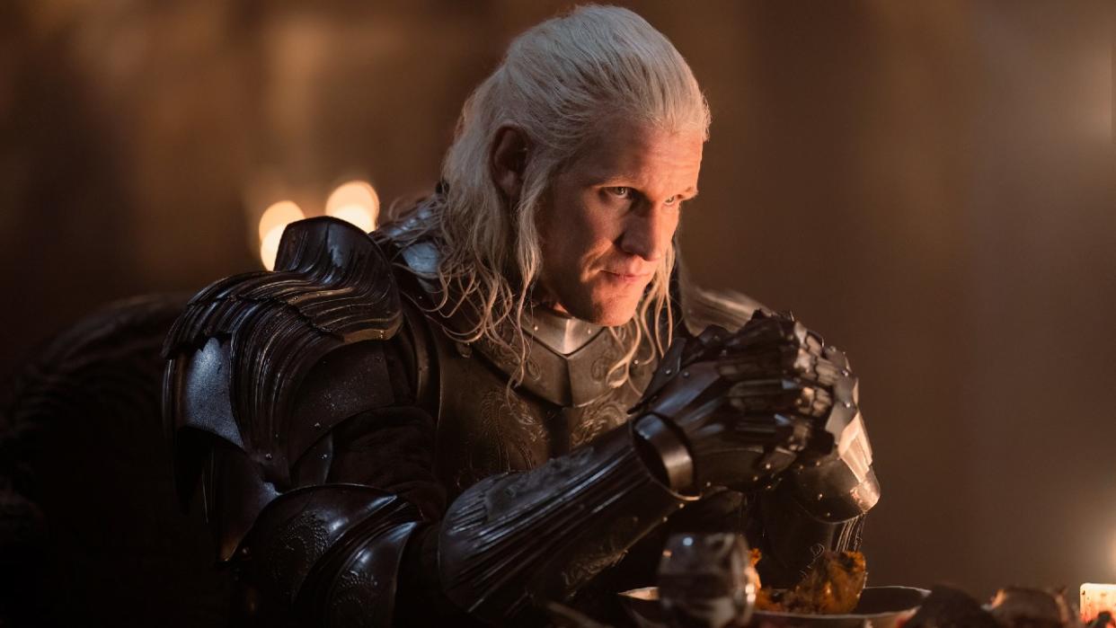  Matt Smith as Daemon Targaryen in Season 2 of House of the Dragon sitting and wearing armor. . 