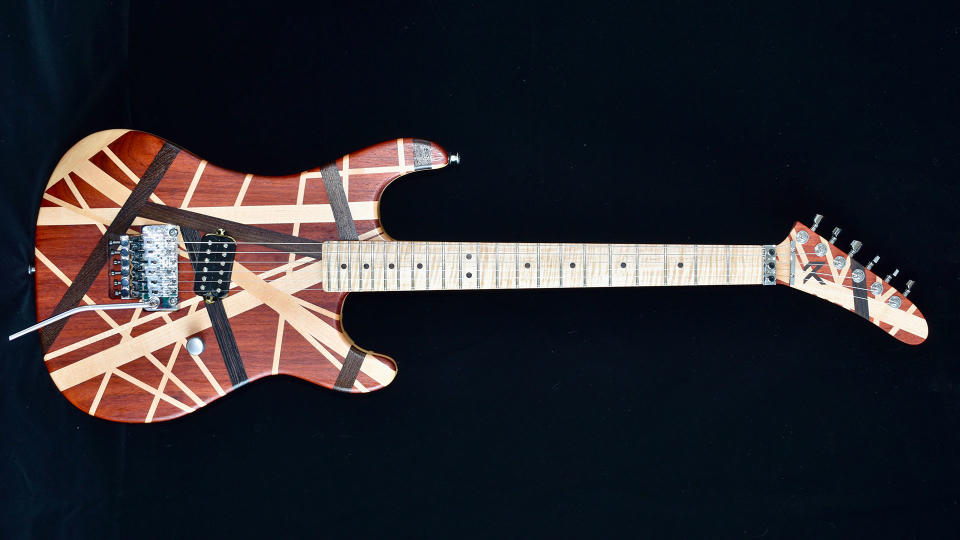 An Eddie Van Halen solid wood striped tribute guitar