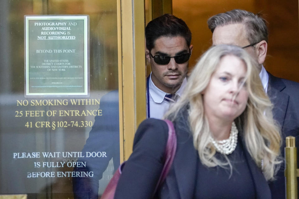 Ryan Salame, left, leaves Federal court with his attorneys, Thursday, Sept. 7, 2023, in New York. Salame, the former top executive at the failed FTX cryptocurrency exchange pleaded guilty Thursday to making tens of millions of dollars in illegal campaign contributions to U.S. politicians and engaging in a criminal conspiracy to operate an unlicensed money transfer business. (AP Photo/Mary Altaffer)