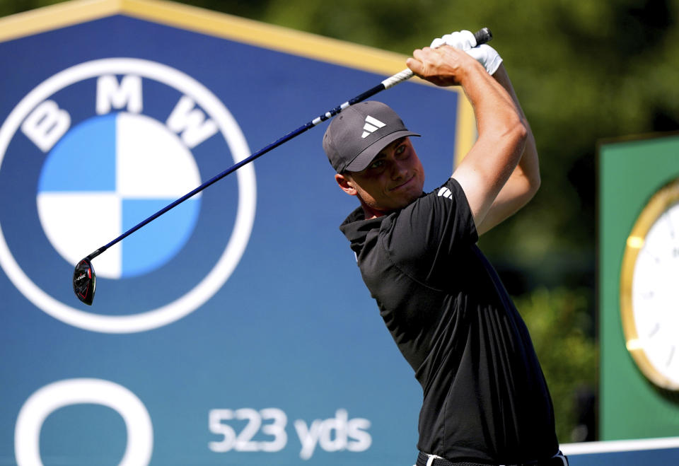 Ludvig Aberg tees off on the 18th during day one of the PGA Championship at Wentworth Golf Club in Virginia Water, Surrey, England, Thursday, Sept. 14, 2023. (Zac Goodwin/PA via AP)