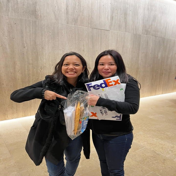 Melor Hidayah Mokhtar (left), an organizer in New York, and Robyn Choi (right). And some of the ballots Choi brought back.