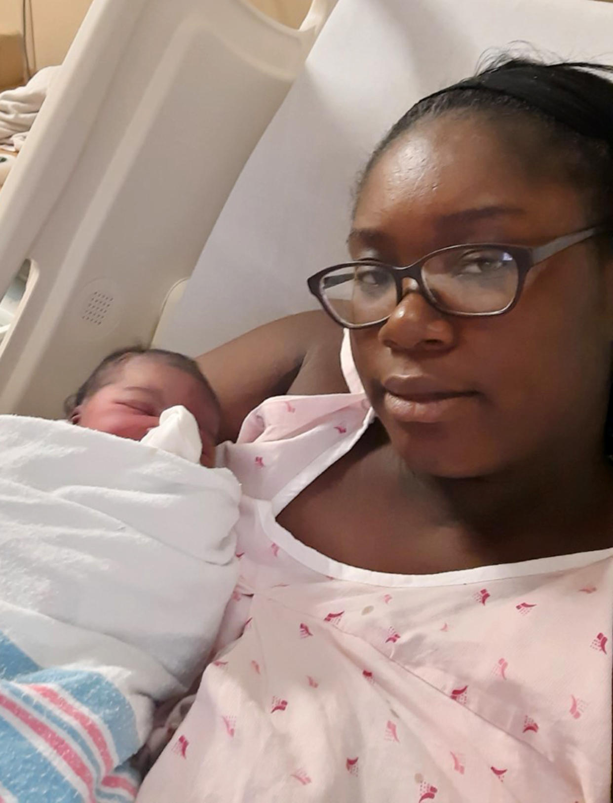 Kudaisi holding her brand new baby girl (Courtesy Queshonda J. Kudaisi)