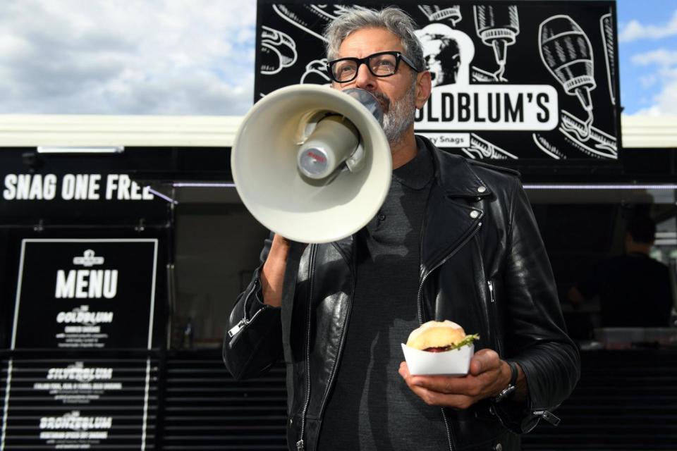 Something to shout about: The US actor drums up interest in his sausage snack (Paul Miller/EPA)