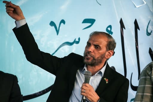 Hamas official Hossam Badran speaks at the Israel-Gaza border, east of Gaza City on August 3, 2018