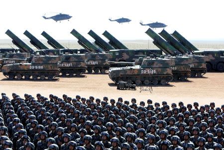 Soldiers of China's People's Liberation Army (PLA) take part in a military parade to commemorate the 90th anniversary of the foundation of the army at the Zhurihe military training base in Inner Mongolia Autonomous Region, China, July 30, 2017. REUTERS/Stringer