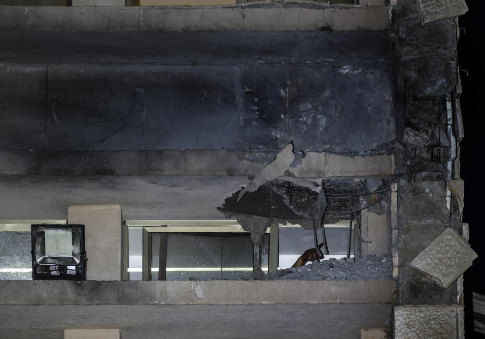 A damage to a Jewish religious school is seen in Sderot, Israel, after it was hit by a rocket fired from the Gaza Strip, Thursday, June 13, 2019. (AP Photo/Tsafrir Abayov)