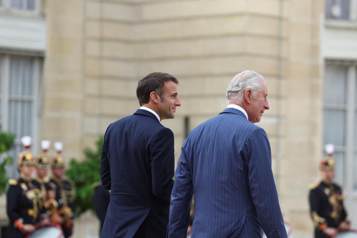 King Charles III (right) walks with French President Emmanuel Macron at the Elysee Palace, Paris, during the state visit to France (Hannah McKay/PA Wire)